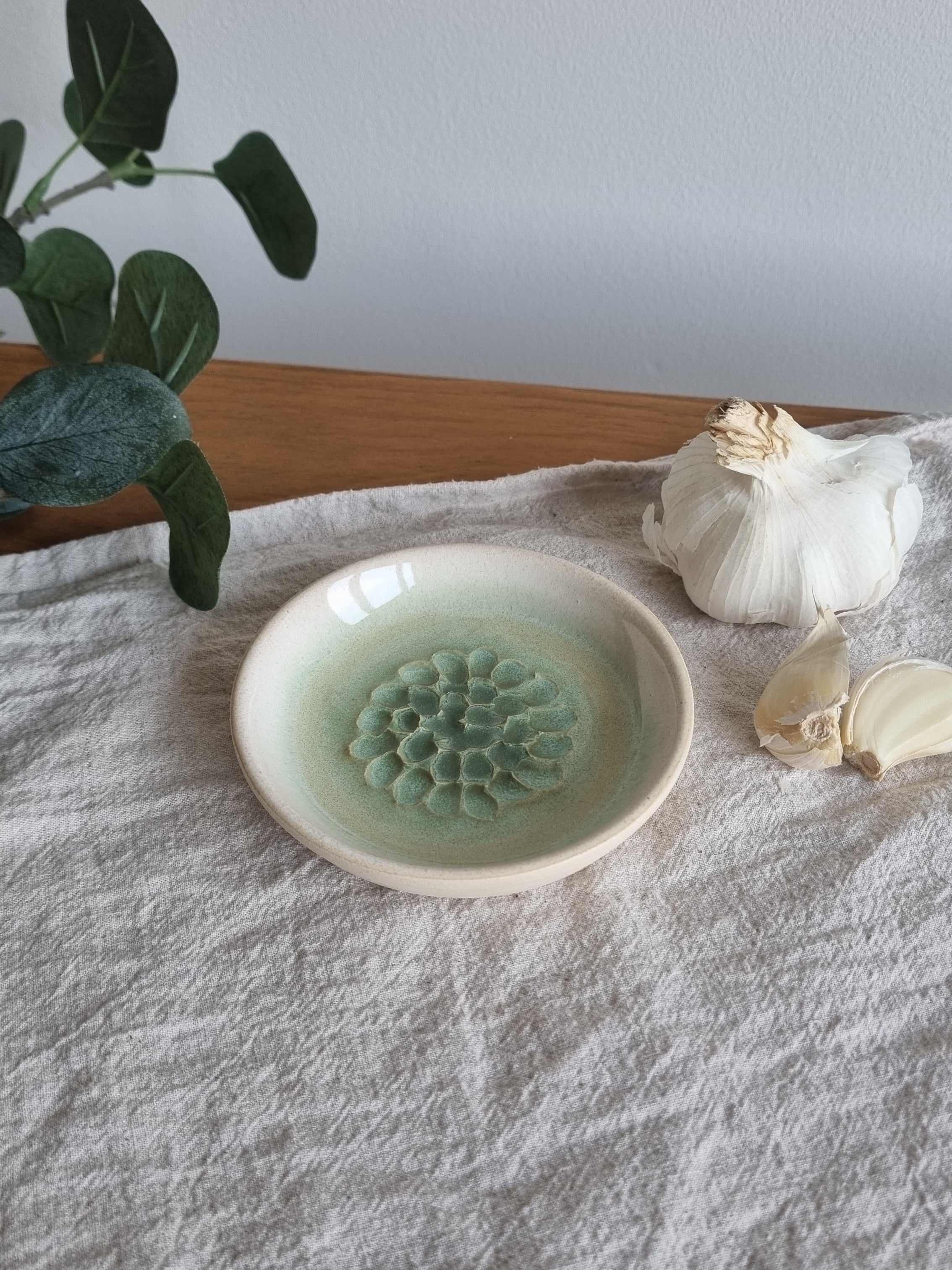 Green and White Ceramic Garlic Grater