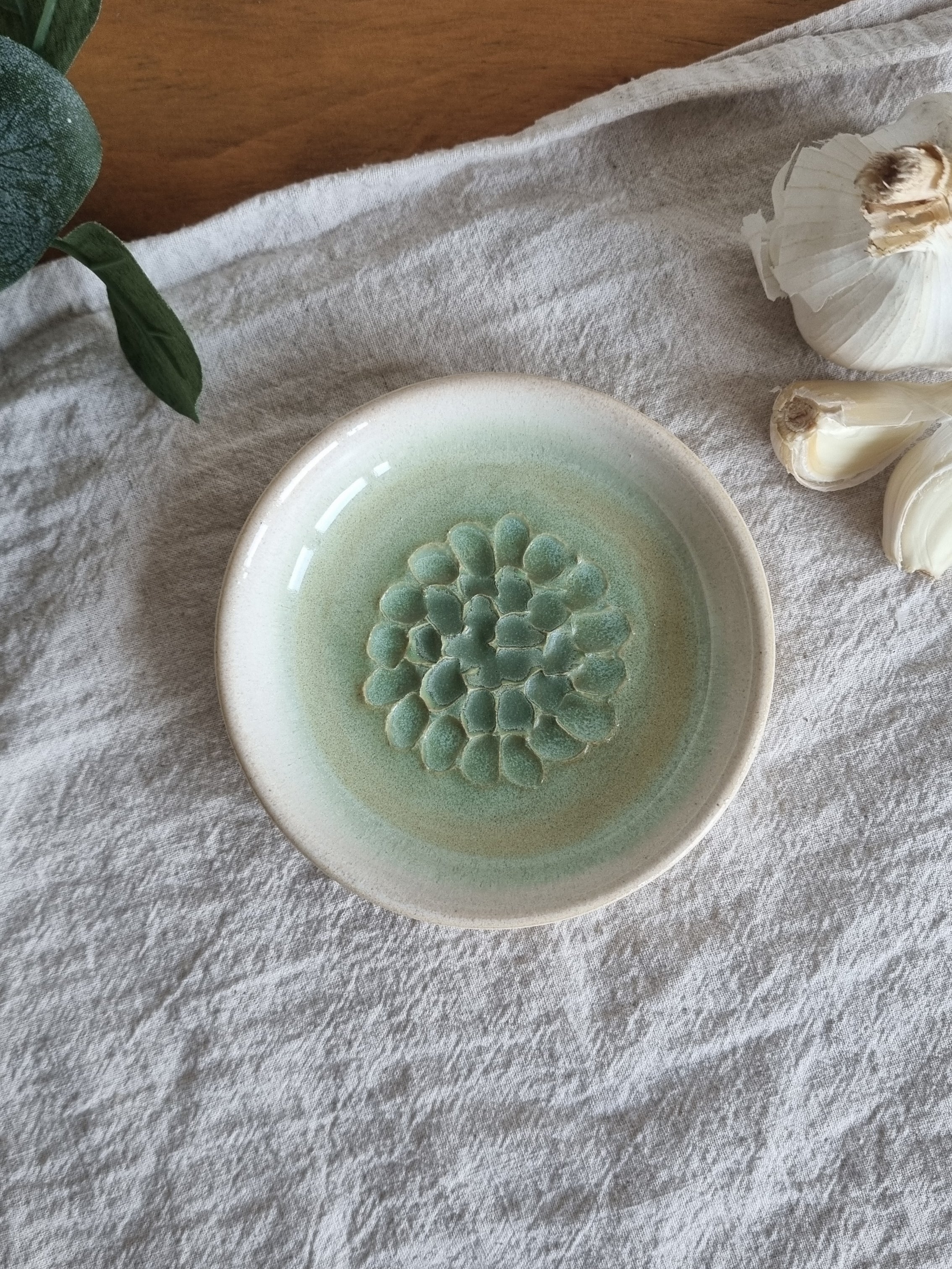 Green and White Ceramic Garlic Grater