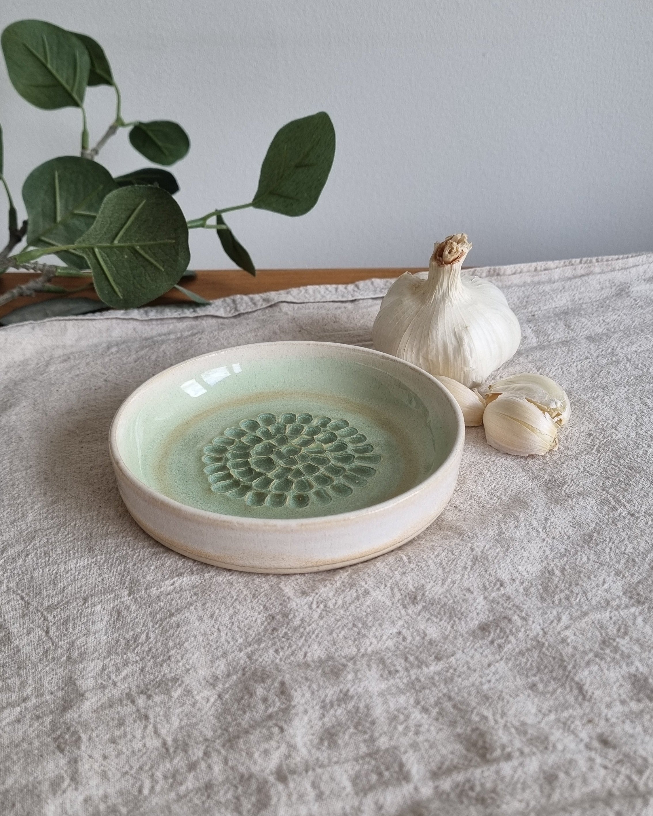 Green and White Ceramic Garlic Grater