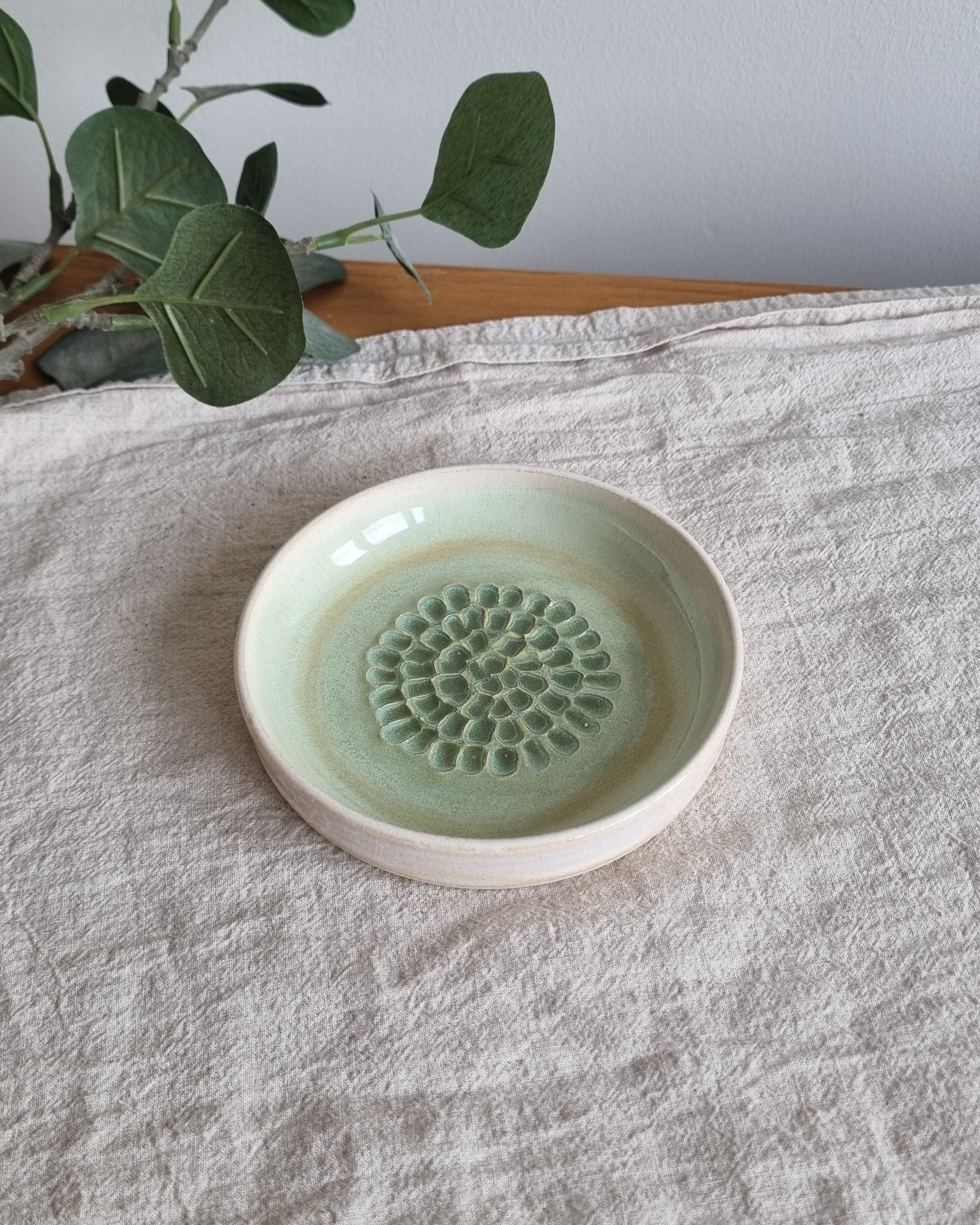 Green and White Ceramic Garlic Grater