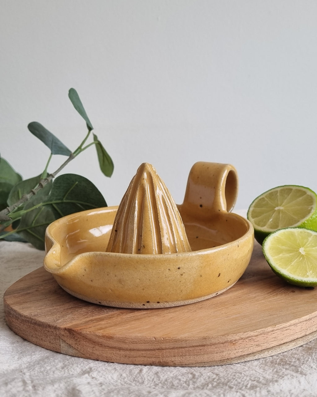 Handmade Ceramic Citrus Juicer with Handle in Golden Yellow Speckle